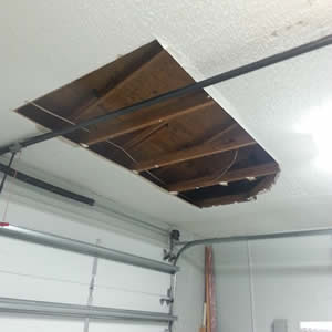 Replacing drywall panels after water damage in a Palm Beach house